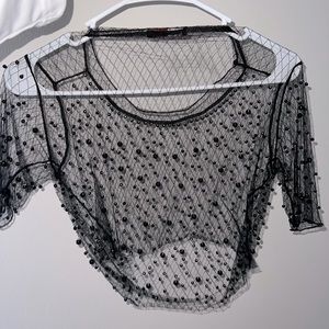 Black embellished woman’s top